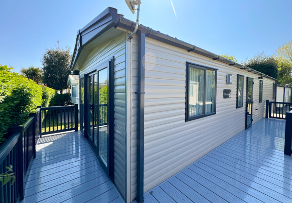 External of a caravan on pitch with decking