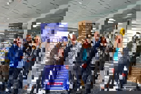 A group of Waterside Team with Dorset Mind Team smiling at the camera