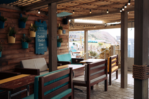 The outdoor seating area of Southside Bar & Grill with covered veranda