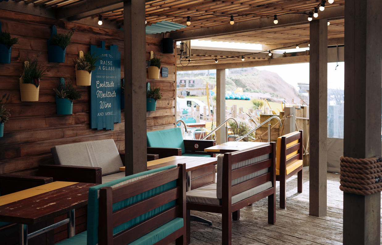 The outdoor seating area of Southside Bar & Grill with covered veranda