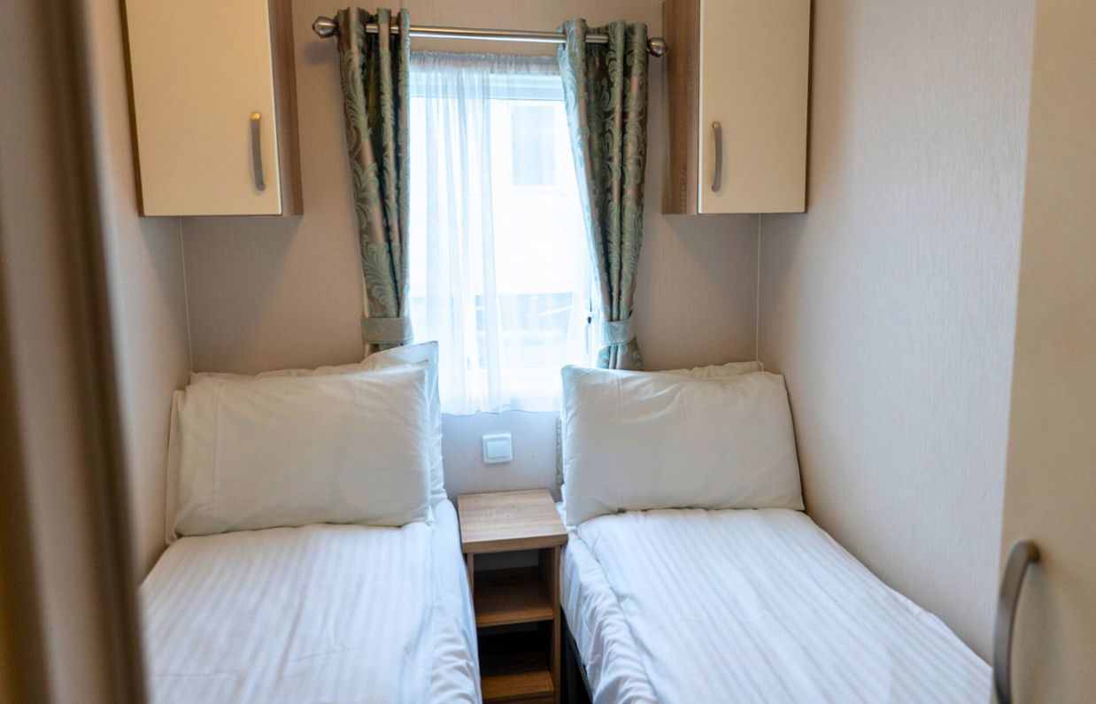 Internal of a caravan twin bedroom
