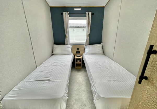 Internal of a caravan twin bedroom