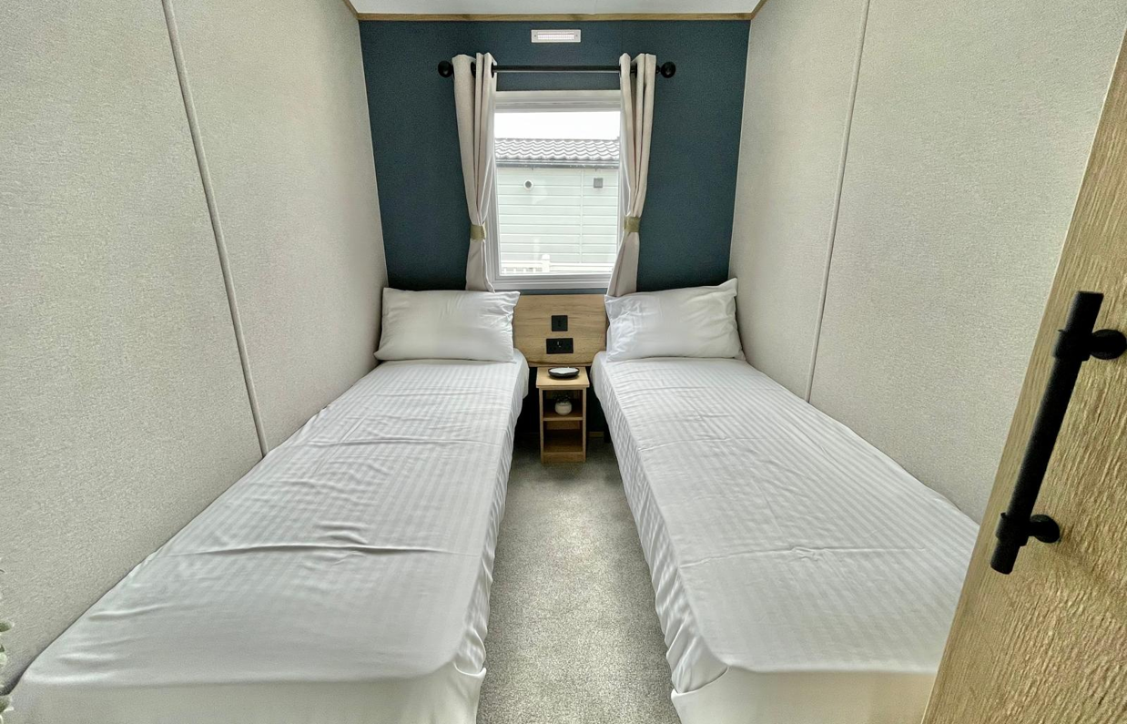 Internal of a caravan twin bedroom