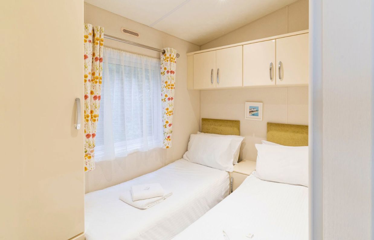 Internal of a caravan twin bedroom