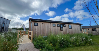 External of a luxury lodge on pitch