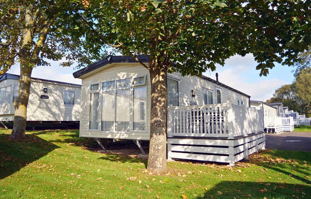External of a caravan on pitch with decking