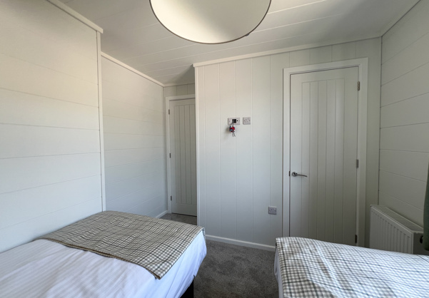 Internal of a luxury lodge twin bedroom