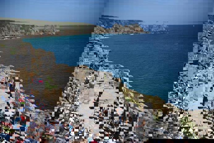 An old theatre remains carved into the coastline with views of the sea