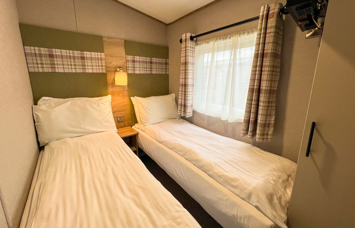 Internal of a caravan twin bedroom