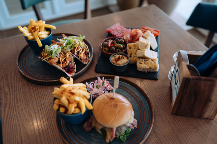 Birds eye view of food on a table at The Drift