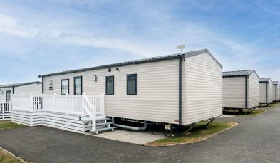External of a caravan on pitch with decking