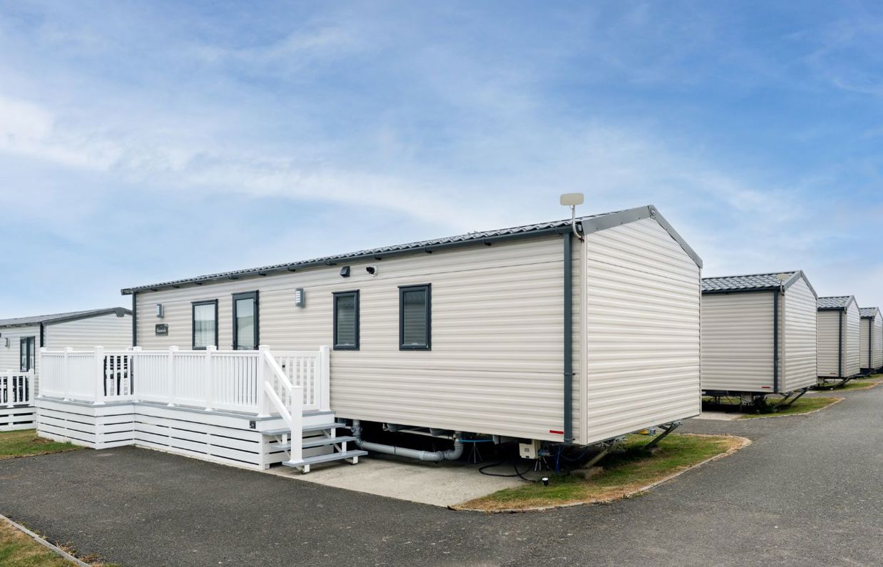External of a caravan on pitch with decking