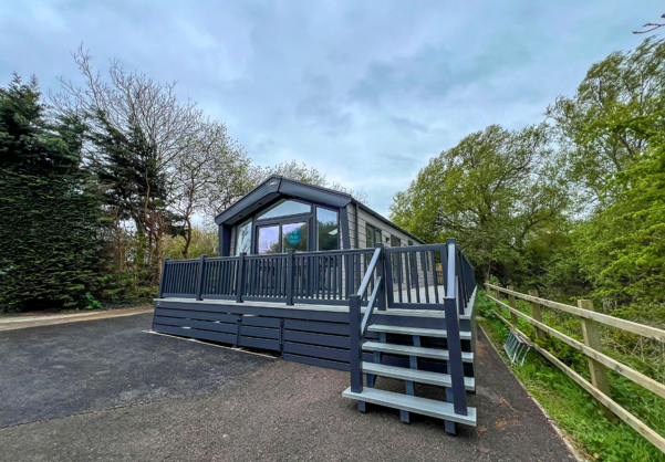 External of a caravan on pitch with decking