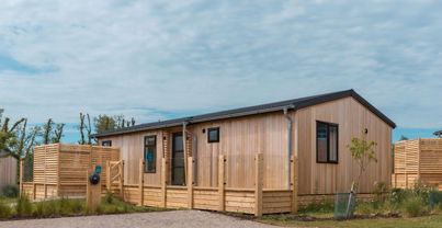 External of a luxury lodge on pitch