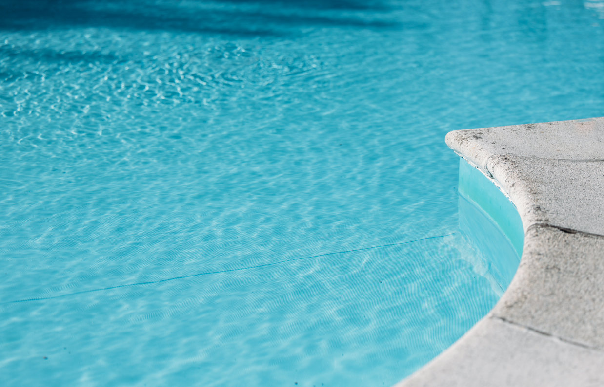A heated outdoor pool with inviting blue waters