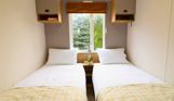 Internal of a caravan twin bedroom