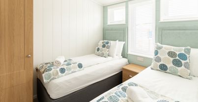 Internal of a luxury lodge twin bedroom