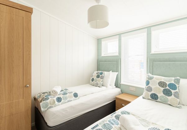 Internal of a luxury lodge twin bedroom