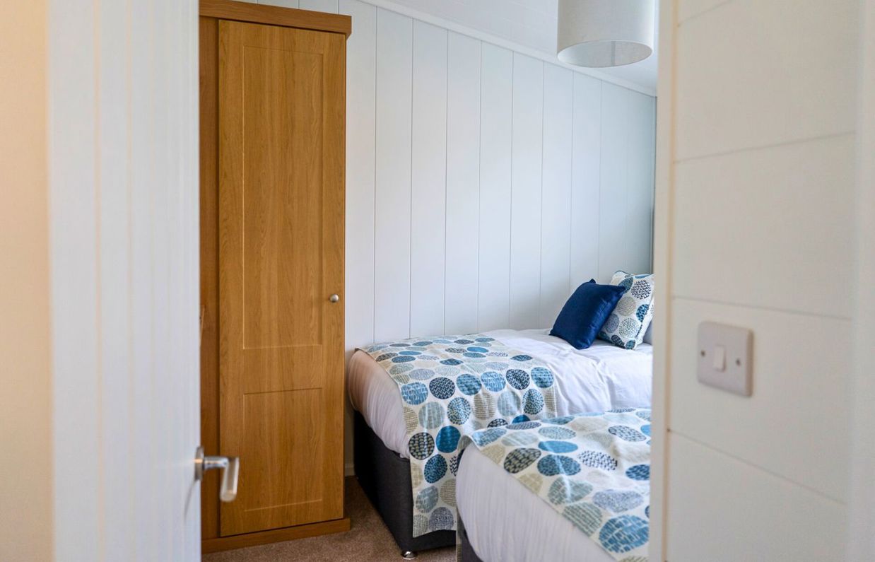 Internal of a luxury lodge twin bedroom