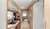 Internal of an accessible caravan open plan kitchen