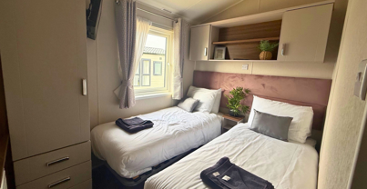 Internal of a caravan twin bedroom