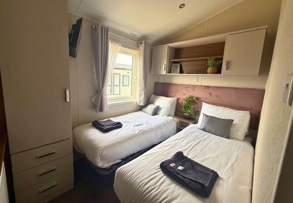 Internal of a caravan twin bedroom
