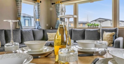 Laid Dining Table with Open Plan Lounge