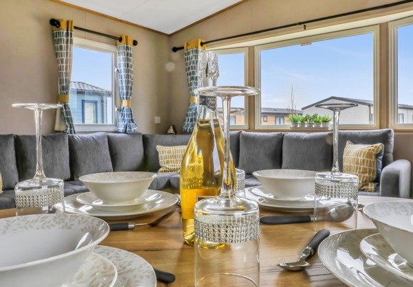 Laid Dining Table with Open Plan Lounge