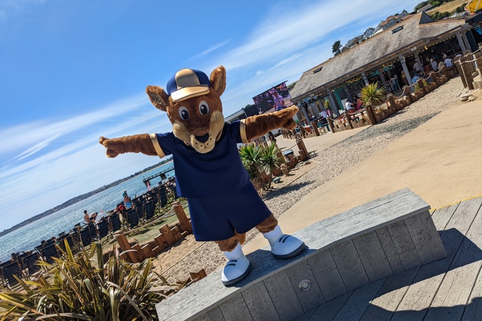 A kangaroo mascot, Boomer, at Southside Green overlooking the sea