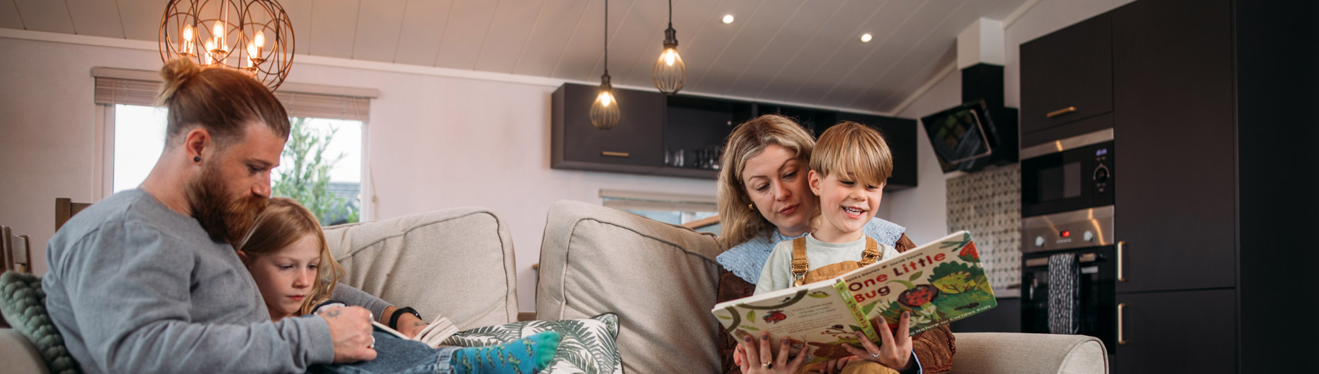 Family enjoying quiet time at holiday home in Tregoad