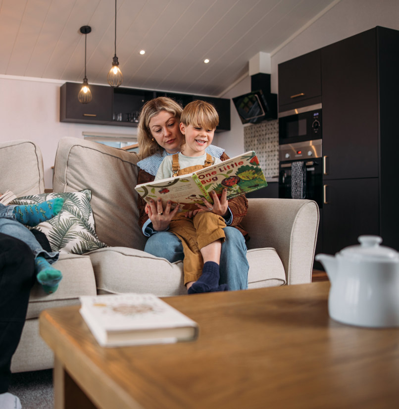 Family enjoying quiet time at holiday home in Tregoad