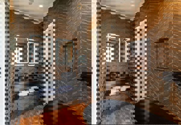 Interior of a Super Lodge Ensuite with His & Hers Sinks and Bath Tub