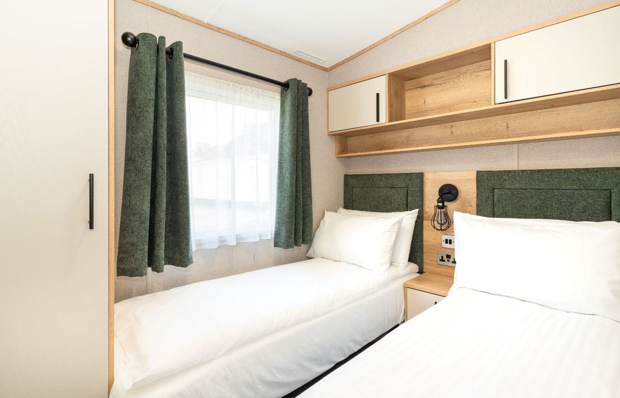 Internal of a caravan twin bedroom