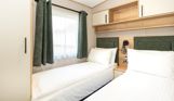 Internal of a caravan twin bedroom