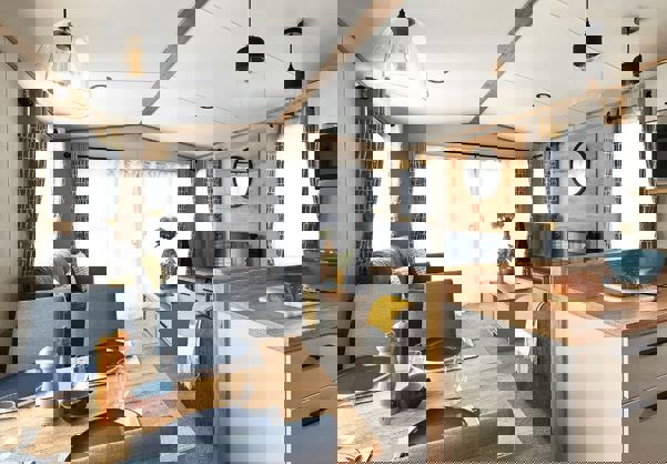 View into lounge from dining table and kitchen