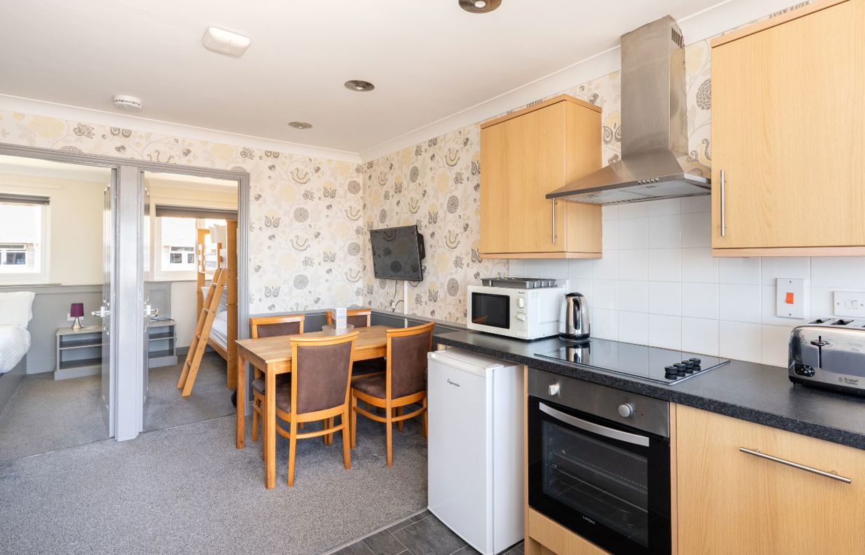 Open plan living space in Chesil Beach apartments