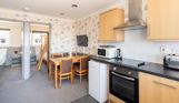 Open plan living space in Chesil Beach apartments