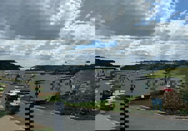 View from holiday home towards valley and sea