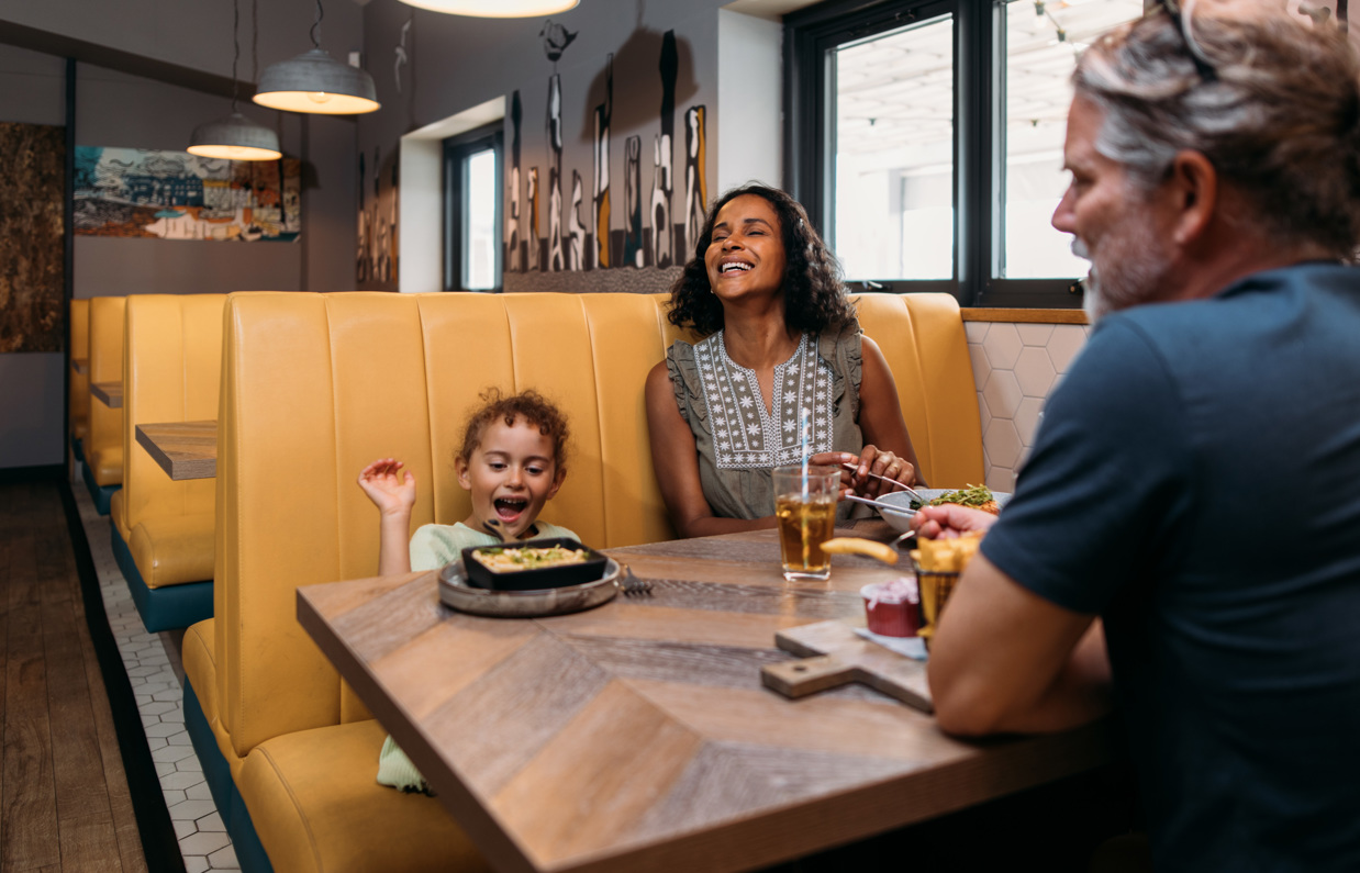 Family having a meal at Chesil Beach