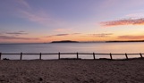 Direct beach access from southside green to bowleaze cove beach at sunset with views of Portland and the bay