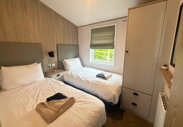 Internal of a caravan twin bedroom