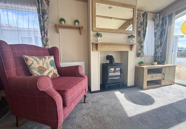 Internal of a caravan lounge with fire