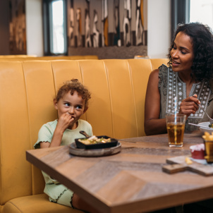Family sharing a meal at a restaurant