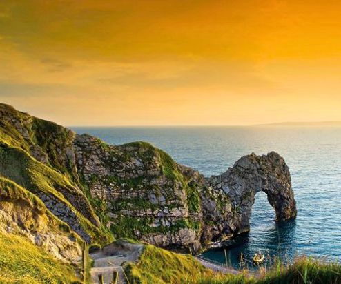 View of Durdle Door at sunset