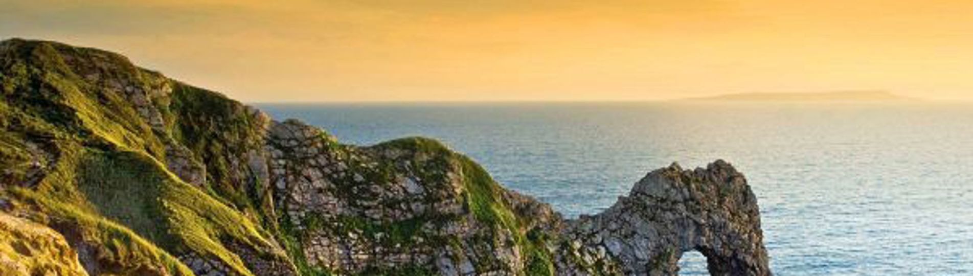 View of Durdle Door at sunset