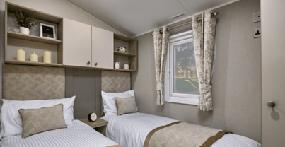 Internal of a caravan twin bedroom