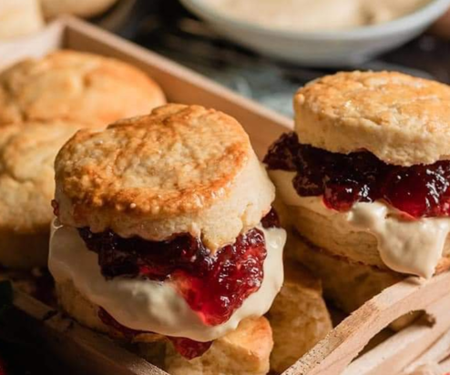 A selection of classic British scones filled with jam and cream