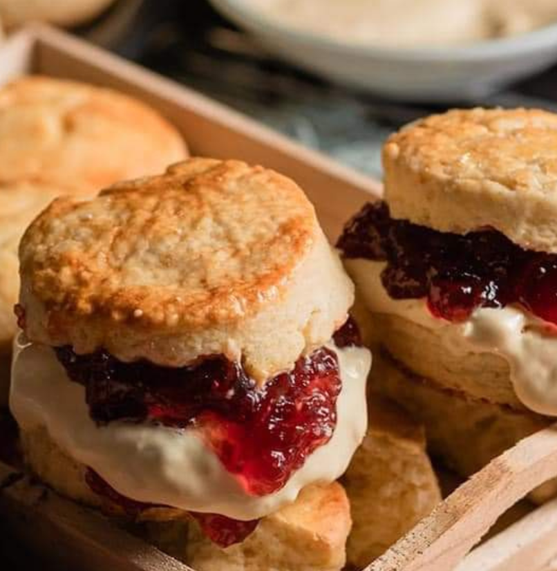 A selection of classic British scones filled with jam and cream