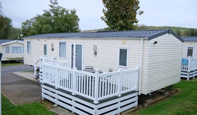 External of a caravan on pitch with decking