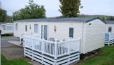 External of a caravan on pitch with decking